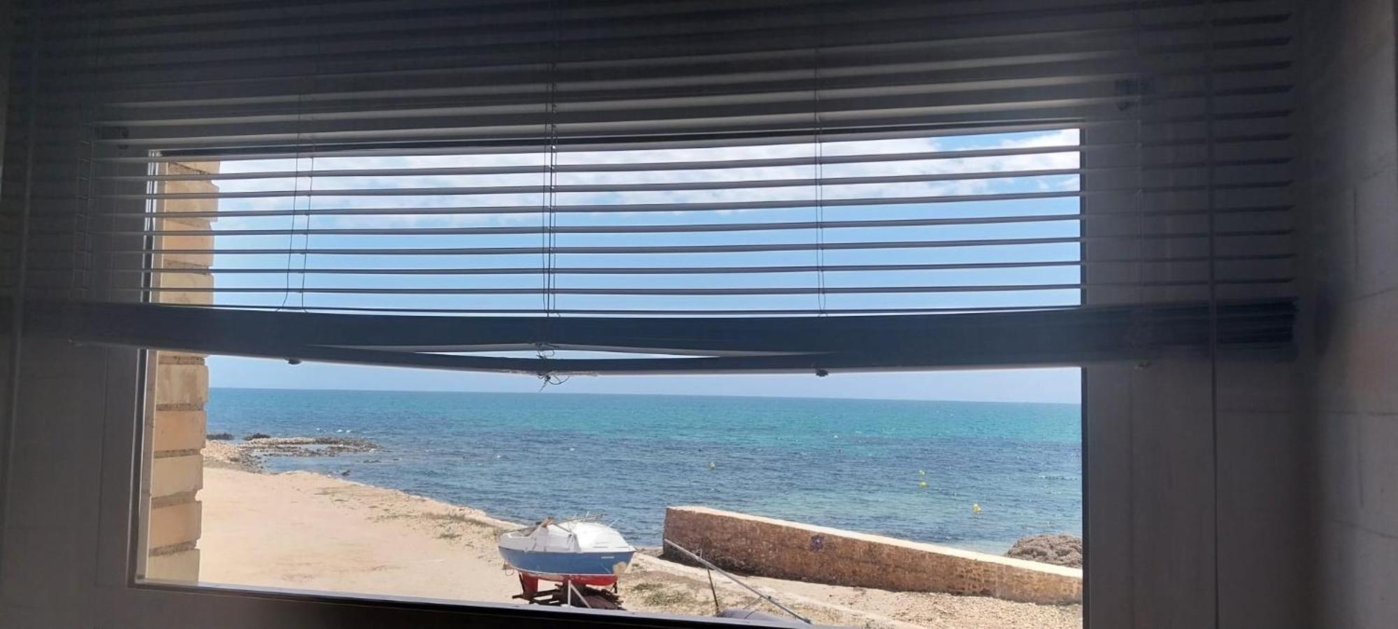 Beachfront Apartment - La Mata トレビエハ エクステリア 写真